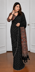 Black Ajrakh printed Modal Silk saree with real mirror work, contrast pallu and blouse piece