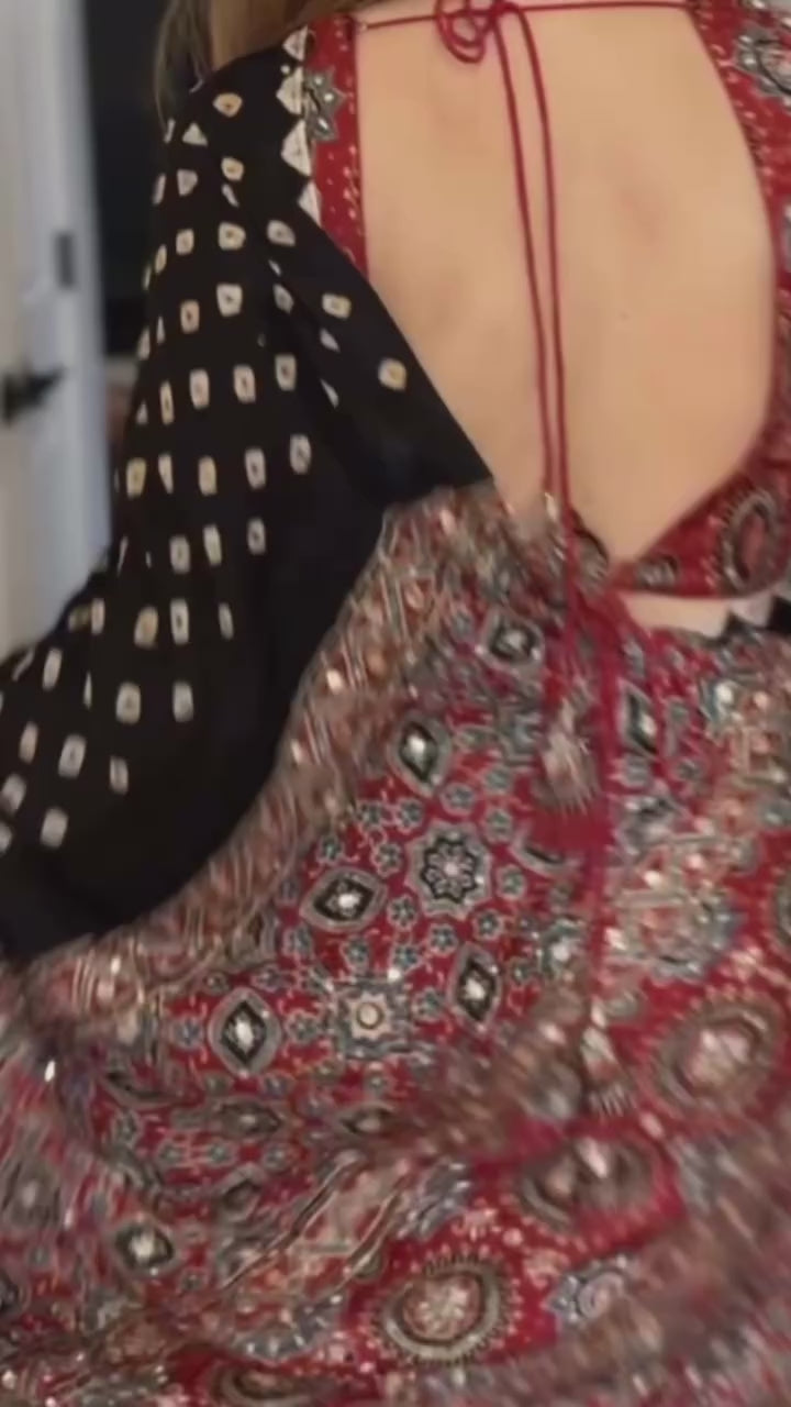 Video of black Ajrakh printed Modal Silk saree with real mirror work, contrast pallu and blouse
